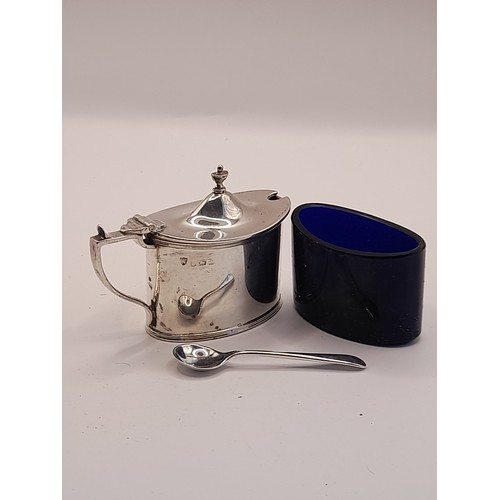 13 - Hallmarked Silver Mustard Pot with silver hallmarked spoon and blue glass liner. 6.5cm high x 9cm wi... 