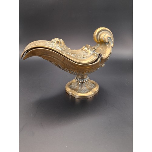 19 - Brass Religious incense boat. 9cm high x 15cm long