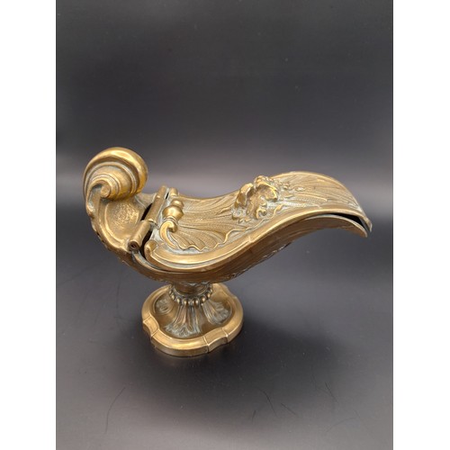 19 - Brass Religious incense boat. 9cm high x 15cm long