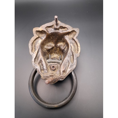23 - Brass Lions head Door Knocker. Head Measures 11cm