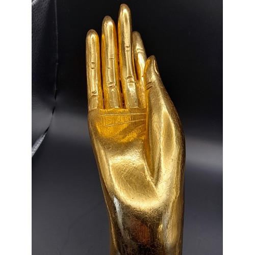 24 - Wooden hand on stand, 24cm high x 27cm wide