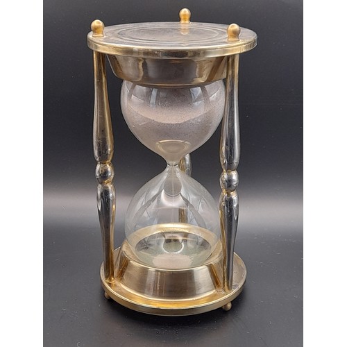 27 - Large metal and glass egg timer standing 22cm high