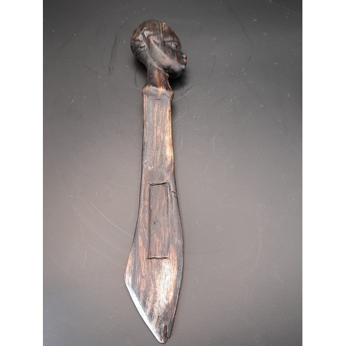 31 - 3 x Treen items to include long  3 x carved wood heads in cage from one piece of wood 47cm long alon... 