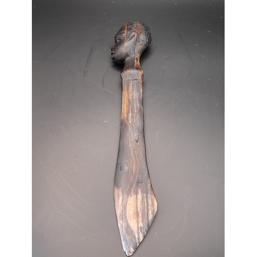 31 - 3 x Treen items to include long  3 x carved wood heads in cage from one piece of wood 47cm long alon... 