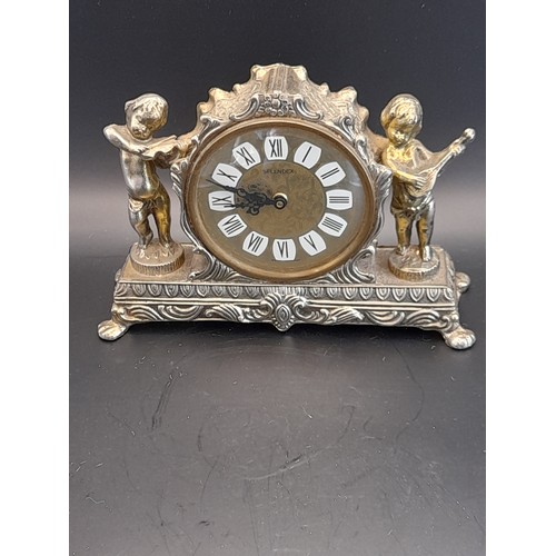 32 - white metal clock by Splendex 17cm wide along with a carved marble box with inlay to lid and a white... 