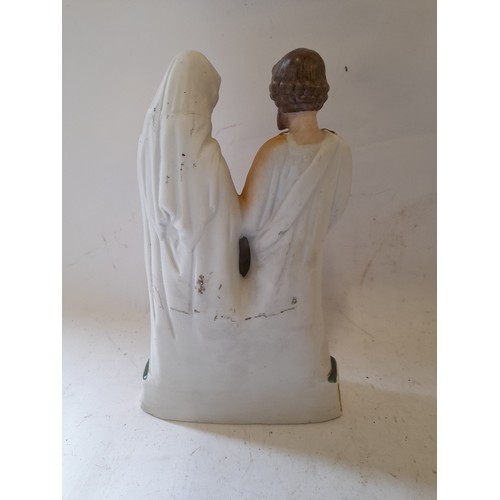 57 - Religious figure 26cm high
