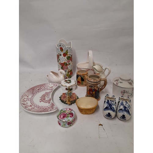 59 - A collection of decorative ceramic to include a Dartington Vase, 20cm tall and an EGG CUP in the for... 