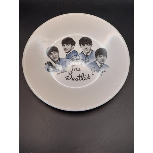 2 - 'The Beatles' memorabilia consisting of Small Plate by Washington Pottery Ltd 7inch dia and a Saucer... 