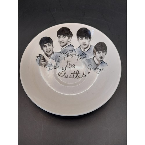 2 - 'The Beatles' memorabilia consisting of Small Plate by Washington Pottery Ltd 7inch dia and a Saucer... 