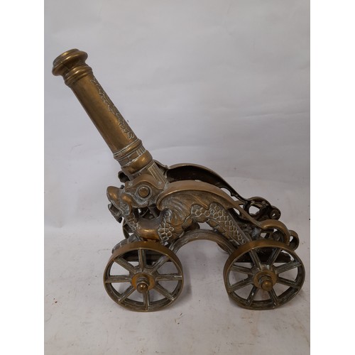 5 - Solid Brass Chinese Dragon Cannon on 4 wheels. 40cm x 34cm x 13cm