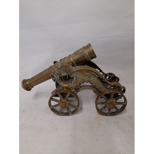 5 - Solid Brass Chinese Dragon Cannon on 4 wheels. 40cm x 34cm x 13cm