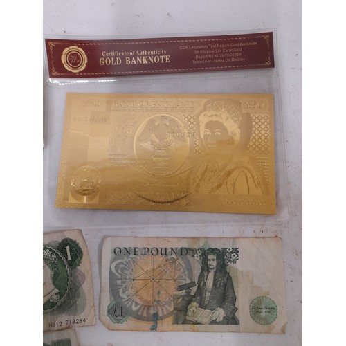 129 - 24K GOLD £50 banknote together with a Quantity of used banknotes (13)