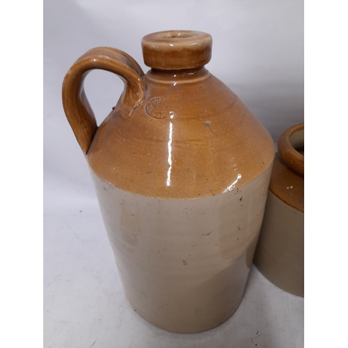 137 - 3 x Stone ware Jars and a Stone Ware Flagon 33cm high (4)