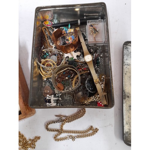 147 - 1 x Tin and a Wooden Box containing a small quantity of jewellery items and lapel badges