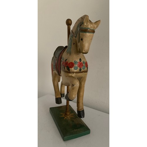 168 - Carved Wooden Carousel Horse
26 cms w x 31 cms h