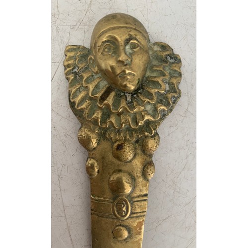 197 - Vintage Brass Paperknife Having A Harlequin Clown Finial
21 cms