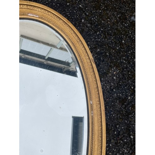 532 - Vintage Oval Bevel Edged Gilt Plaster Framed Mirror. 92 x 56 cms