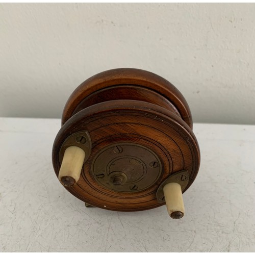 114 - Antique Wooden Starback Centre Pin Fishing Reel
8 cms diameter