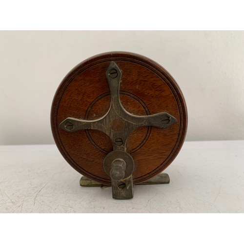 115 - Similar To Previous Lot
Antique Wooden Starback Centre Pin Fishing Reel
7.5 cms diameter