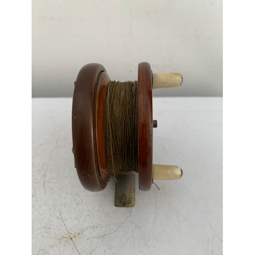 115 - Similar To Previous Lot
Antique Wooden Starback Centre Pin Fishing Reel
7.5 cms diameter