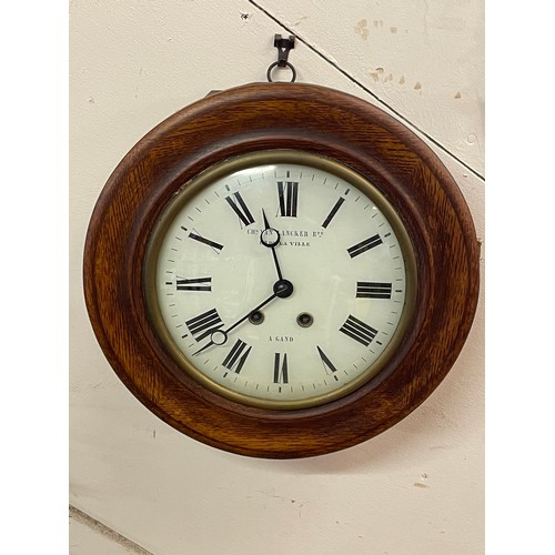 21 - Continental School Clock With Key And Pendulum. 38 cms Diameter.