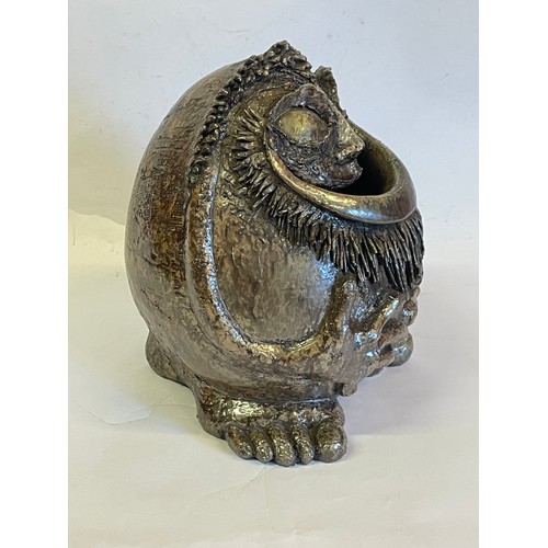 151 - 1970's Pottery Grotesque Figure Signed To Base. 27 cms High