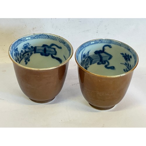 168 - Two Chinese Ceramic Cups With Internal Blue And White Decoration.