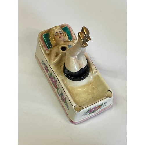 169 - Vintage Novelty Ceramic Ashtray In The Form Of A Recumbent Lady With Moving Legs. 14 x 7 x 13 cms