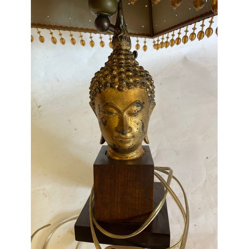 259 - Mounted Buddha Head Lamp. 48 cms High