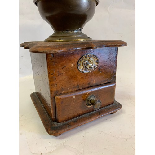 110 - Antique Coffee Grinder By GARANTI 
15 x 15 x 25 cms h