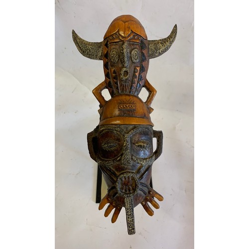 132 - Similar To Previous Lot
Miniature Tribal Mask On Stand
24 x 26 cms h