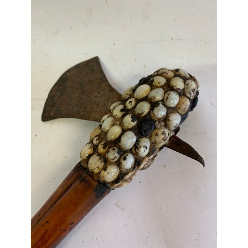 136 - Vintage Lega Tribal Axe Having Cowie Shell Décoration And Bone Carved Hanndle
30 cms