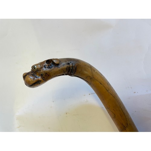 297 - Vintage Folk Art Walking Stick With Carved Dogs Head Finial. 86 cms