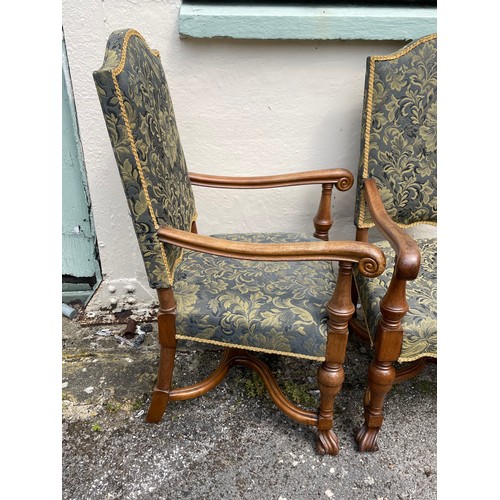 27 - Two Upholstered Carolean Style Walnut Elbow Chairs