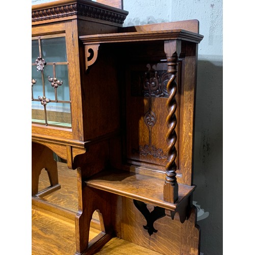 40 - Arts And Crafts  Glazed Unit With Carved Wood Decorated Doors And Copper Decorated Glass. 137 x 56 x... 