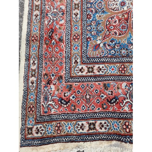 81 - Large Blue and Red Ground Rug, 310cm x 217