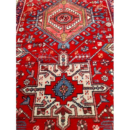 82 - Red Ground Wool Rug, 154cm x 88cm