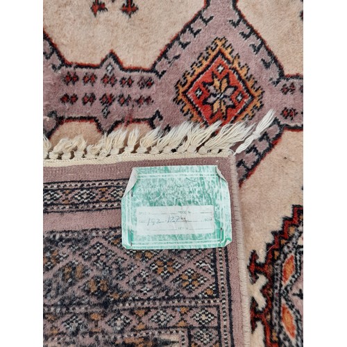 83 - Brown Ground Rug Handmade in Pakistan, 182cm x 127cm