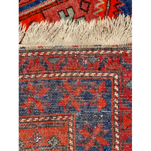 89 - Blue Ground Handmade Rug with Orange Pattern, 211cm x 133cm