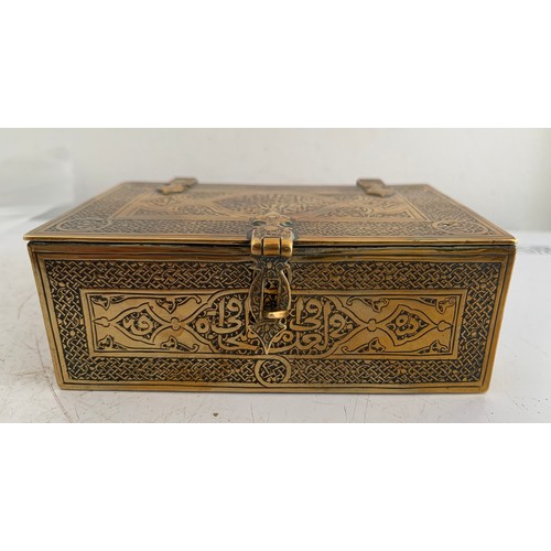 142 - Antique Brass Box In The Form Of A Lidded And Banded Trunk Having Islamic Etched Decoration
11 x 7 x... 