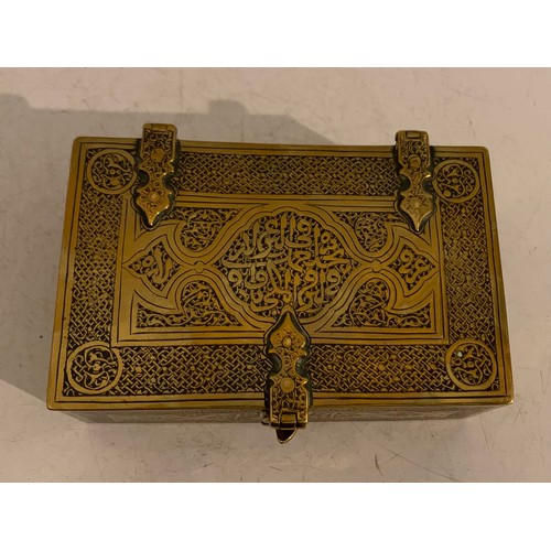 142 - Antique Brass Box In The Form Of A Lidded And Banded Trunk Having Islamic Etched Decoration
11 x 7 x... 