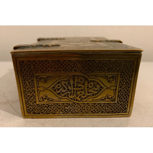 142 - Antique Brass Box In The Form Of A Lidded And Banded Trunk Having Islamic Etched Decoration
11 x 7 x... 