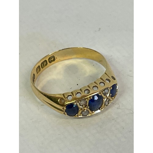 344 - 18ct Gold Hallmarked Diamond And Three  Sapphire Stone  Ring Size P      2.9g