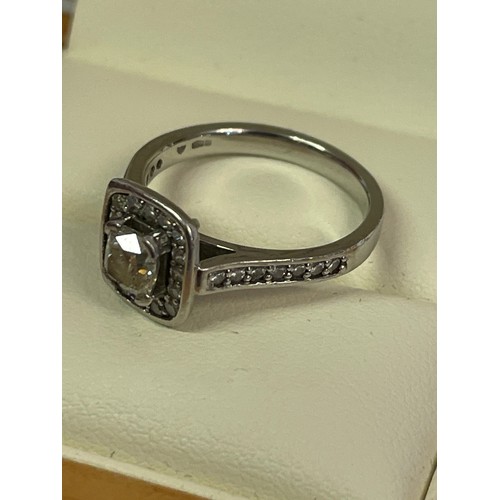 350 - 950 Platinum Set Diamond Ring  With 0.5 Carat Cushion Cut Centre Diamond Surrounded By Smaller Diamo... 