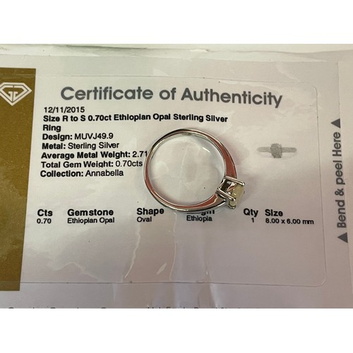 354 - Sterling Silver Ring Set With A 0.70ct Ethiopian Opel With Certificate Size R 1/2