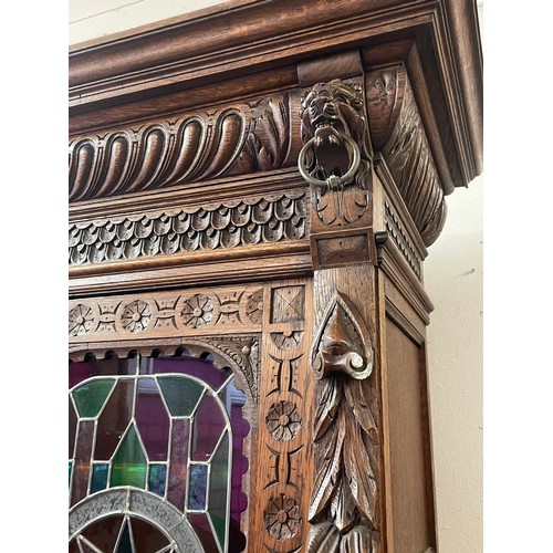 38 - Antique Continental Hunt Cabinet With Coloured Glass Door Panels Along With Carved Decoration To Inc... 