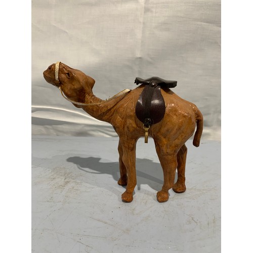 233 - Miniature Vintage Leather Clad Statue Of A Camel
20 x 16 cms h