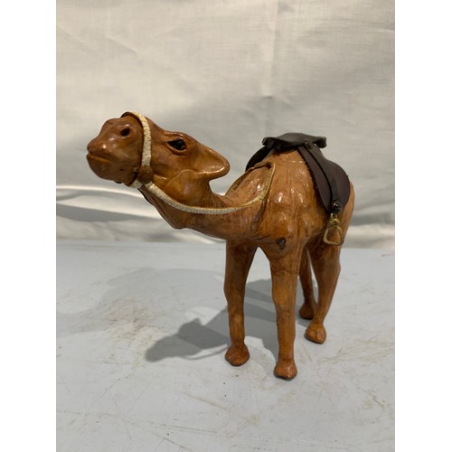 233 - Miniature Vintage Leather Clad Statue Of A Camel
20 x 16 cms h