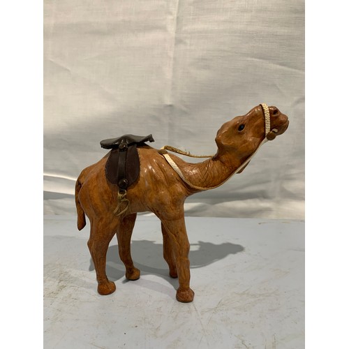 233 - Miniature Vintage Leather Clad Statue Of A Camel
20 x 16 cms h