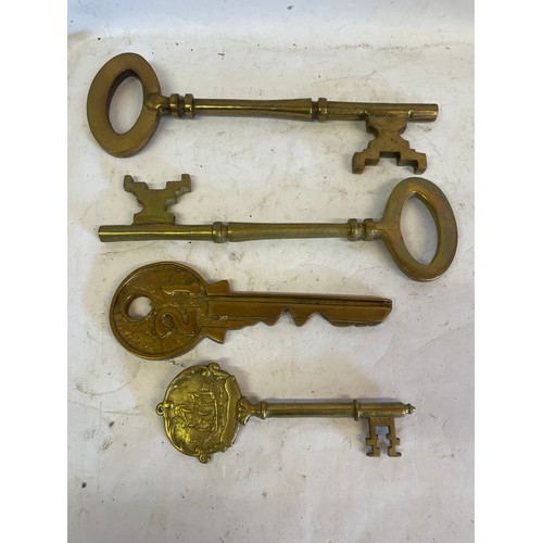 469 - Two Large Vintage Solid Brass keys Along With Two Other Brass Keys (4) Largest 35.5 cms